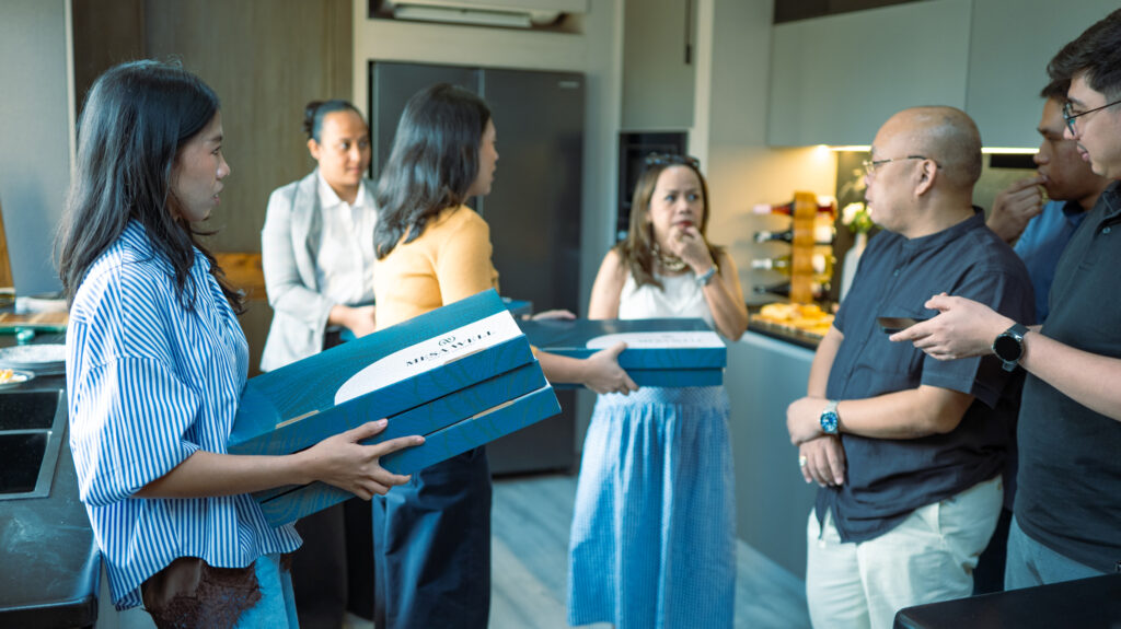 Media guests exploring Mesawell home décor collection